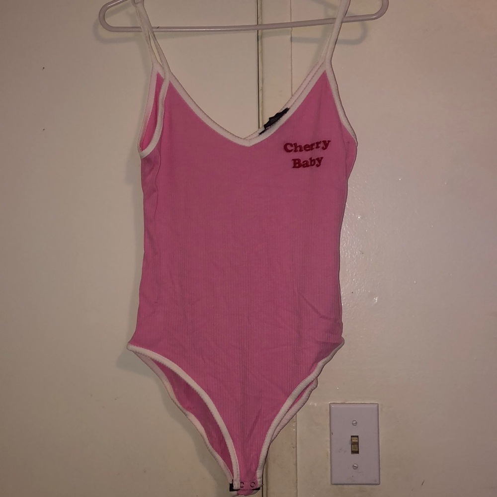Pink body suit